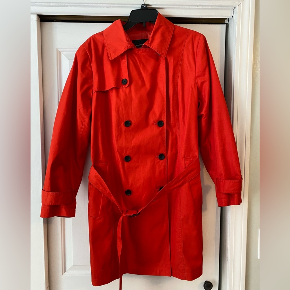 Red belted trench coat